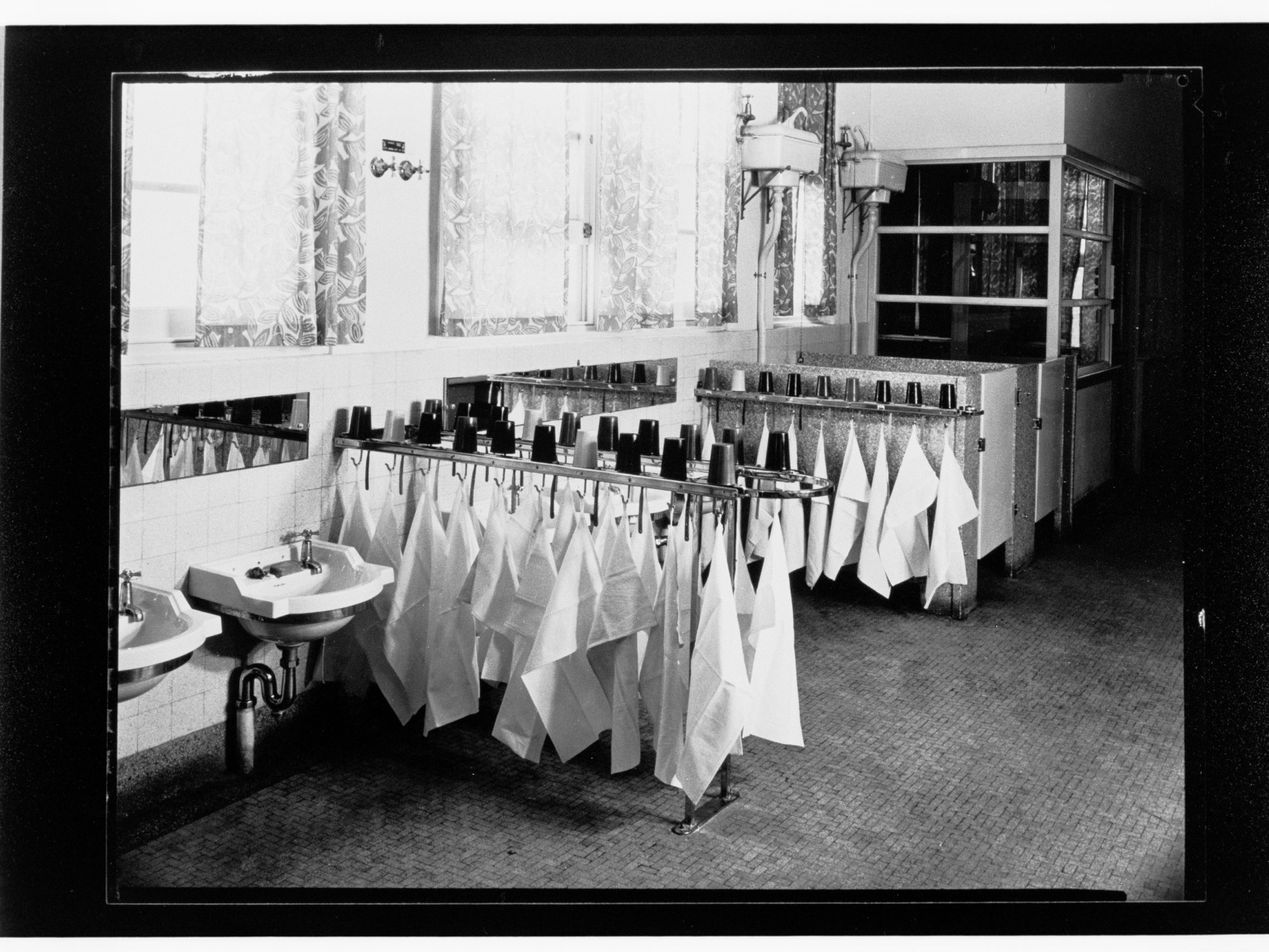 Children's Welfare Department - towels &amp; toothmugs in bathroom