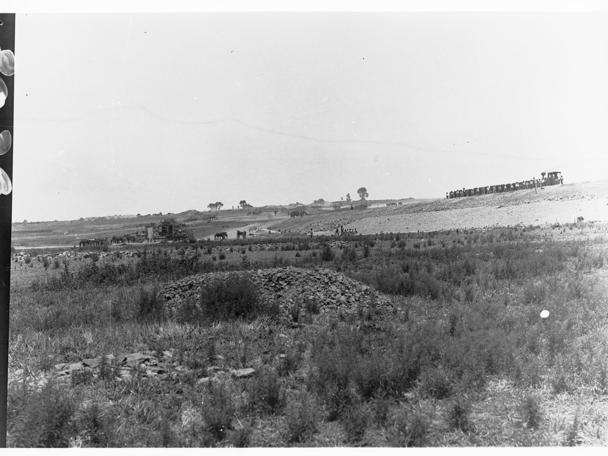 Happy Valley Waterworks - men working on digging of pipeline