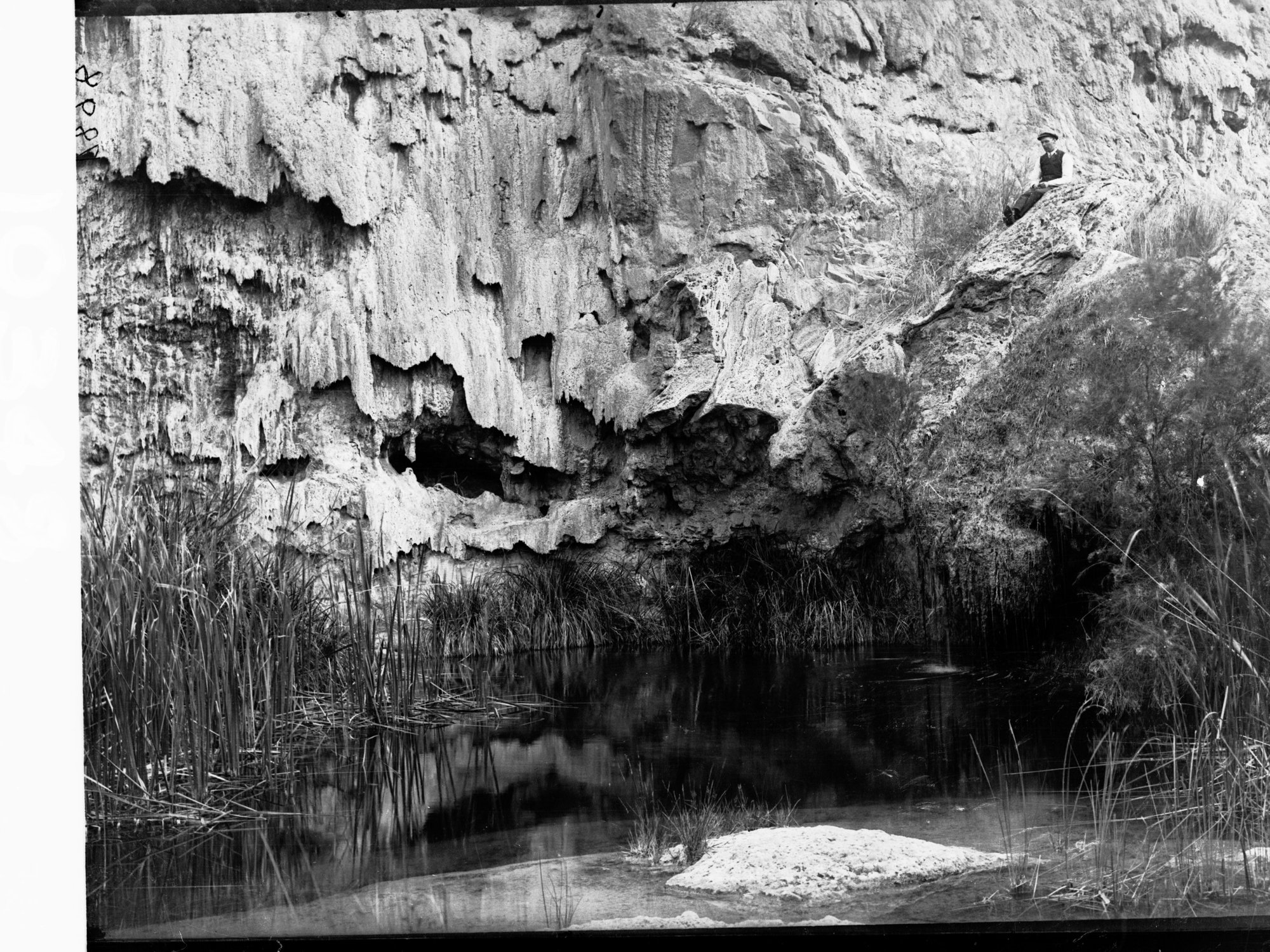 Mora Waters Flinders Ranges, man sitting on rocks