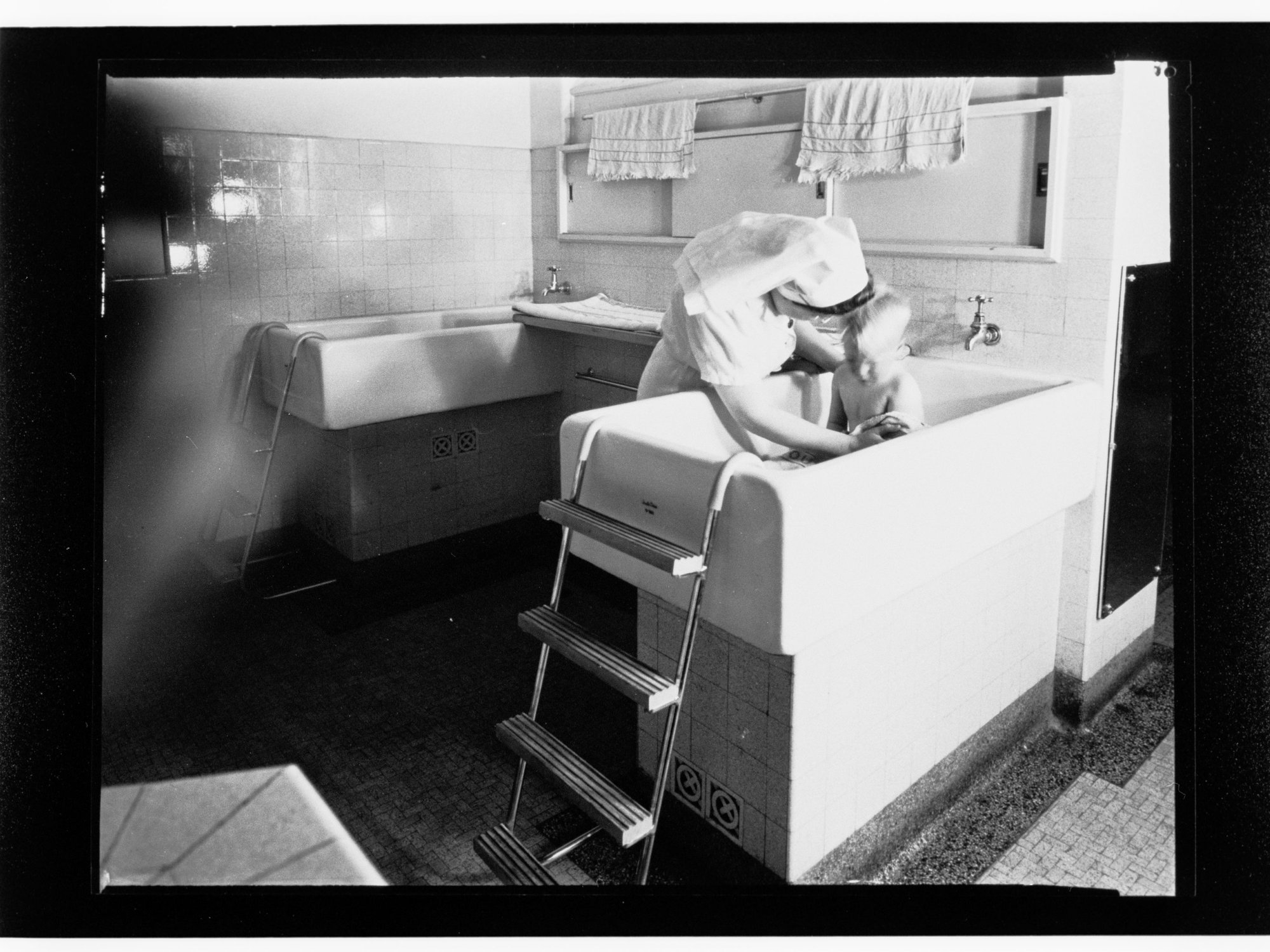 Children's Welfare Department - child bathed by nurse