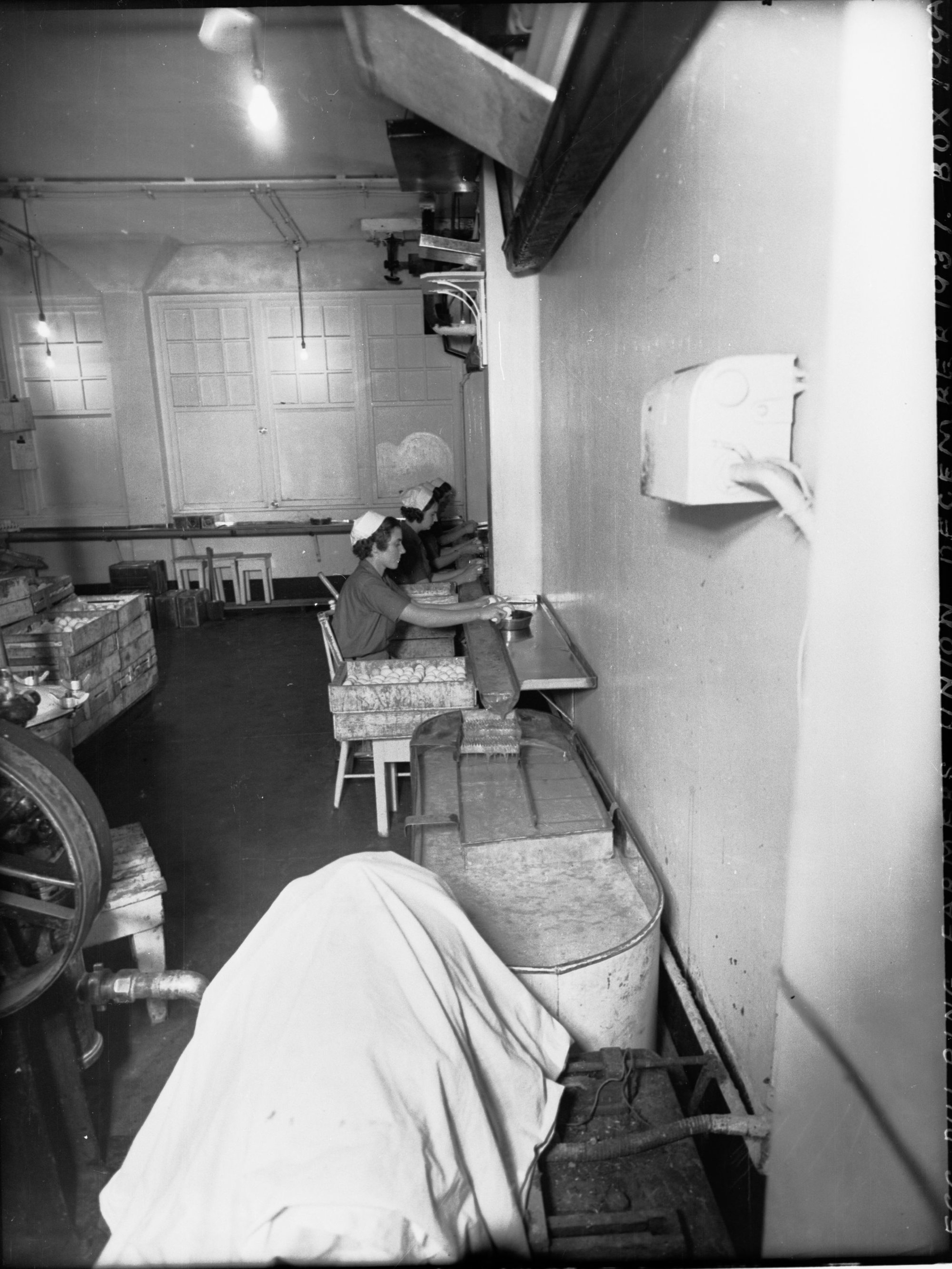 Women egg pulping at Farmer's Union