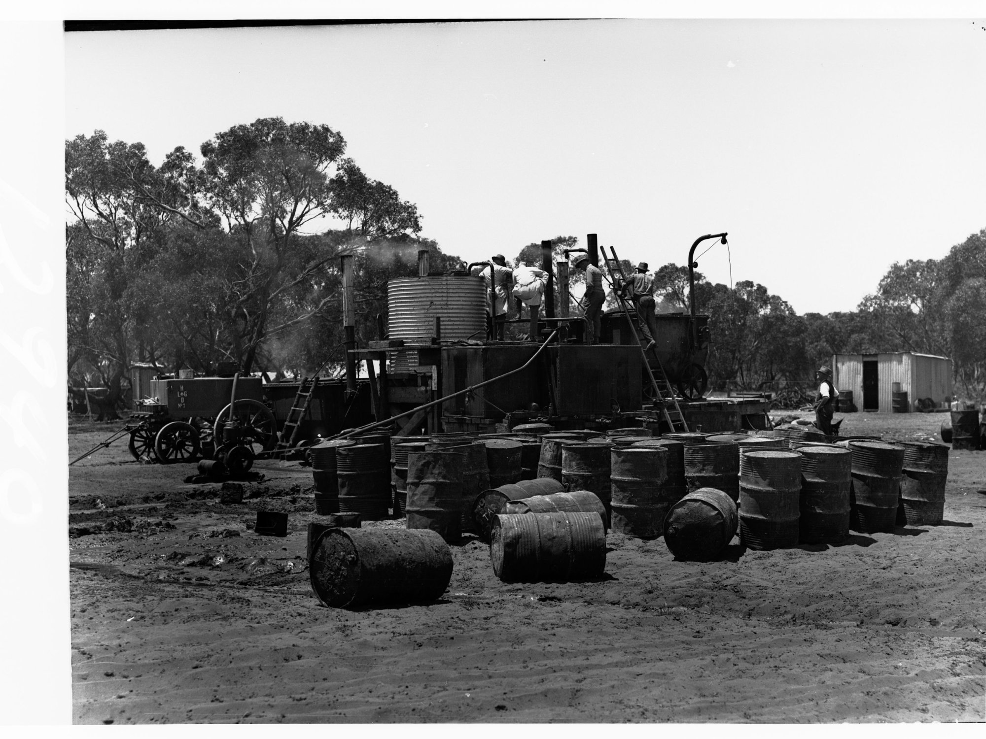 Men mixing tar for road construction at Tailem Bend