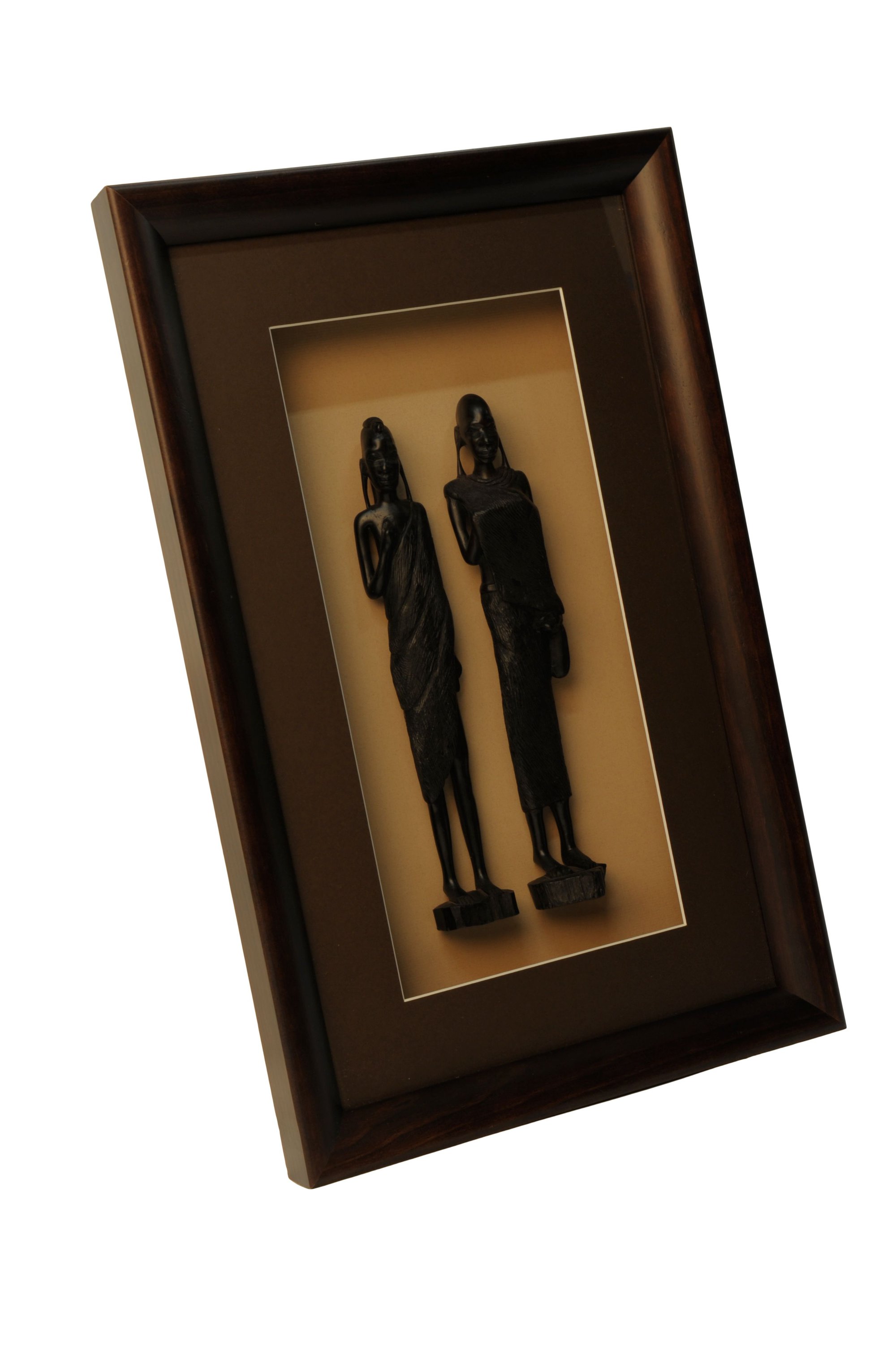 Two carved statuettes in frame