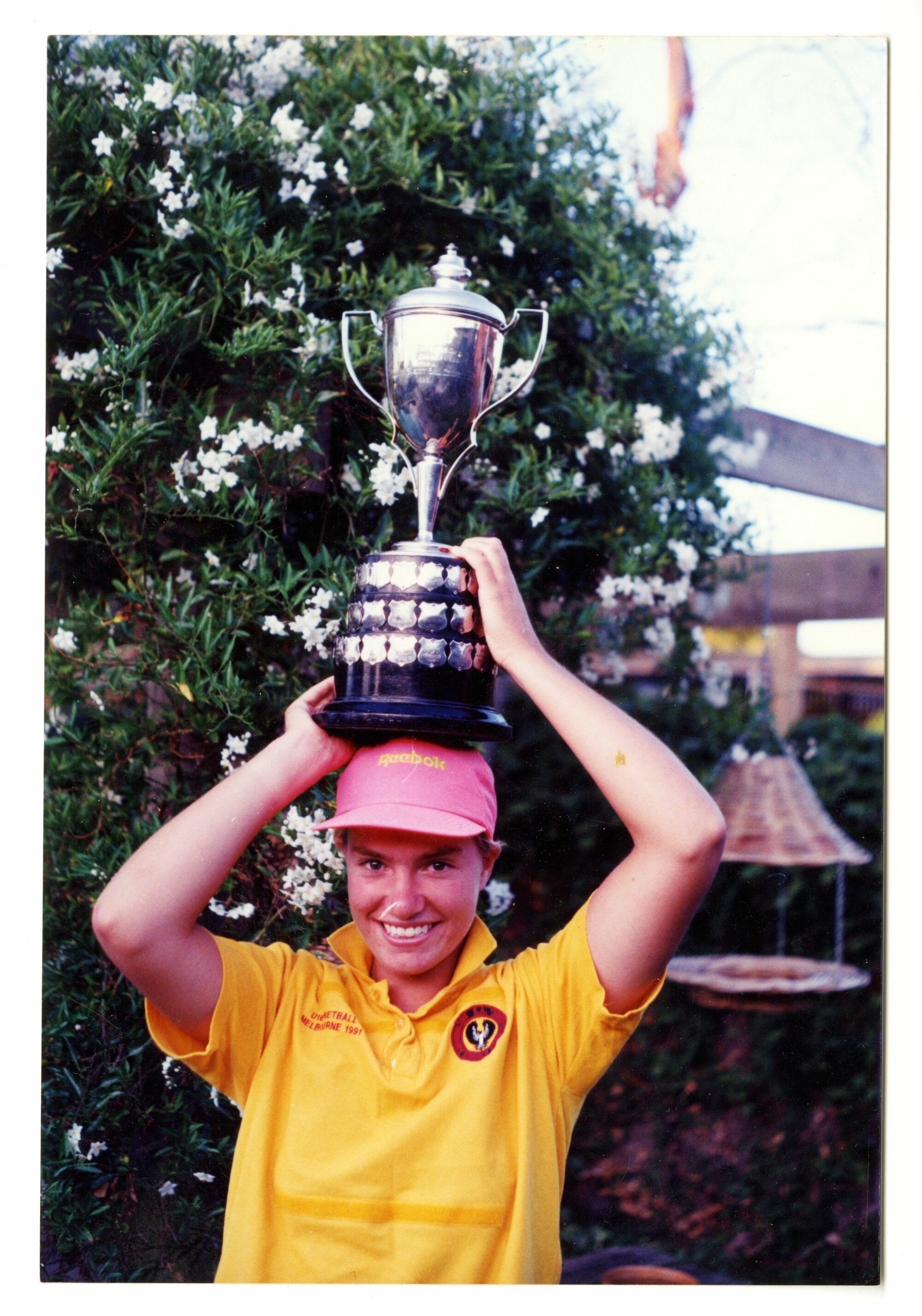 Amy Gillett with netball championship medal