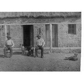 Two Macdonalds Sitting Outside Hut at Cootanoorina Elder Expedition