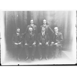 Group photograph of Peake  Ministry - (Standing W.H. Henry, E.A.Anstey.  Sitting H.N. Barwell, A.H. Peake, J.G. Bice, G. Ritchie)