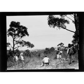 National Fitness Council - people with backpacks standing on a hill