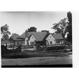 Tourist Bureau showing large house
