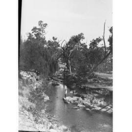 Boy near river