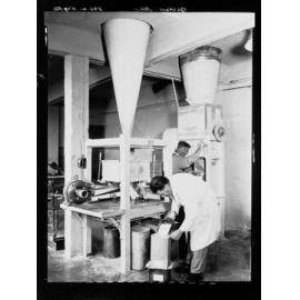 Beckers Ltd - two employees using equipment