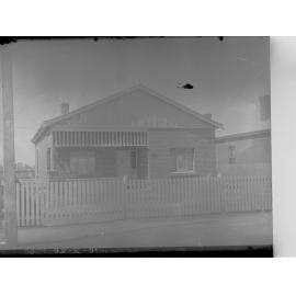 A Soldiers' Home, South Australia, with a picket fence in the foreground