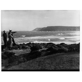 Coastal views showing people standing on rocks