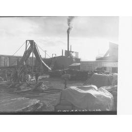 Men loading wheat sacks at Flour Mill Port Adelaide