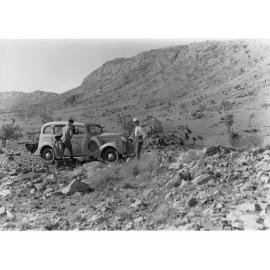 MacDonnell Range Showing Two Men With Photographic Equipment and Automobile Near