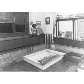 Man Working in Photographic Laboratory