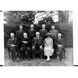Group Photo of Identified Men WIth One Women in Front Row