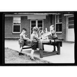 Child Welfare Department,  four small boys doing  woodwork