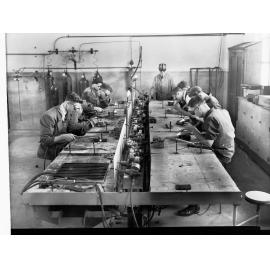Students working in metal work room