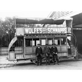 Three Conductors in Front of Horse Drawn Tram