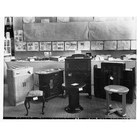Woodworkers trade school exhibition showing tables, drawers and cabinets