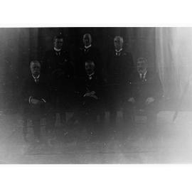 Group photograph of Peake Ministry - shows H N Barwell, G Ritchie, E A Anstey, R Butler, A H Peake and J G Bice