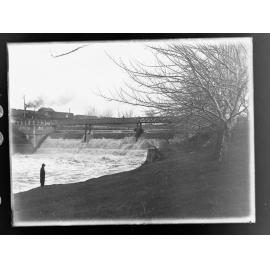 The Torrens Weir with the river in flood 