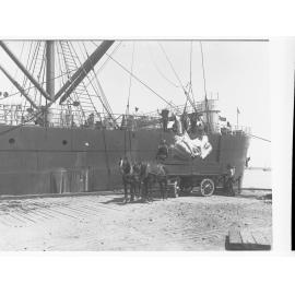 Cargo being loaded onto a ship