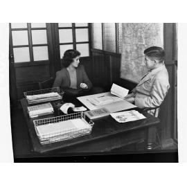 Vocational Guidance - Man and Woman at Desk