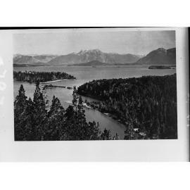Lake Showing Mountains wit Pine Trees