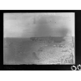 View of two men driving a wagon pulled by horses, Nullarbor Plain