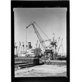 Port Pirie - goods being loaded/unloaded onto ship by crane