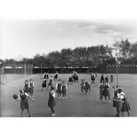 Girls playing netball 