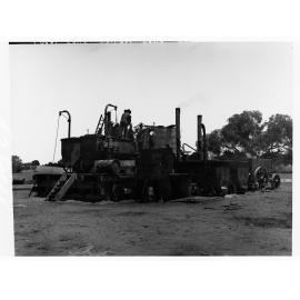 Men mixing tar for road construction at Tailem Bend