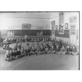 Children sitting in a circle at Thebarton Primary School