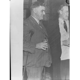 Two men drinking beer