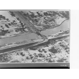 Aerial view of lock and bridge along River Murray showing irrigation channel