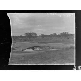 Railway construction survey for East West Line, view showing trees, land and shrubs and rock hole