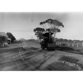 Steam Roller on Road Showing Housing