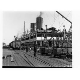 Ship berthed at Port Adelaide showing wharfing facilities