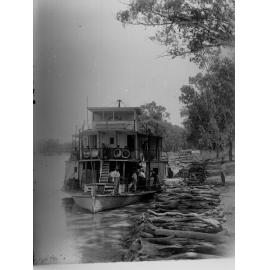 Loading wood on River Murray steamer