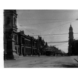 King William Street looking north from Victoria Square, includes statue of Colonel Light and trams