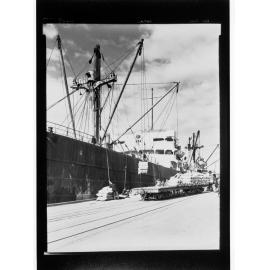 Port Pirie - goods being loaded/unloaded onto ship by crane