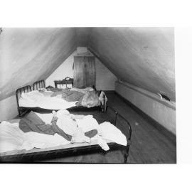 Unmade Beds in Dormitory