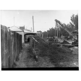 Sewers Department - Alberton, Pipes being laid through street