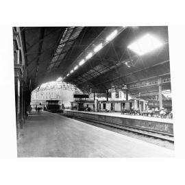 Adelaide Railway Station Showing Platforms and Passenger Sitting on Seats Nearby