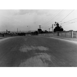 Bridge Over Railway Line on Port Road Showing Newmarket Hotel in Distance