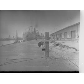 Birkenhead Wharf No. 2 Berth - shows steamship Australpool berthed at wharf and also shows subsidence in roadway
