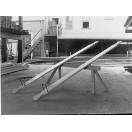 Education Department, South Australia - showing see-saws and back view of the building