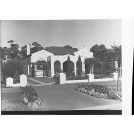 Tourist Bureau showing large house