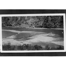 View of River Passing Through Mountain Range